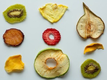 Various dehydrated fruits on a white background
