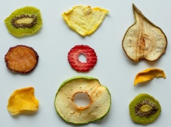 Various dehydrated fruits on a white background