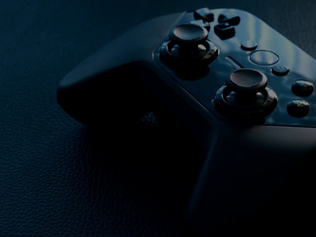 An image of a black game controller.