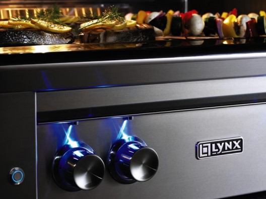 Lit up knobs on a Lynx grill.