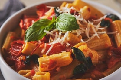 Bowl of macaroni pasta with fresh tomato sauce