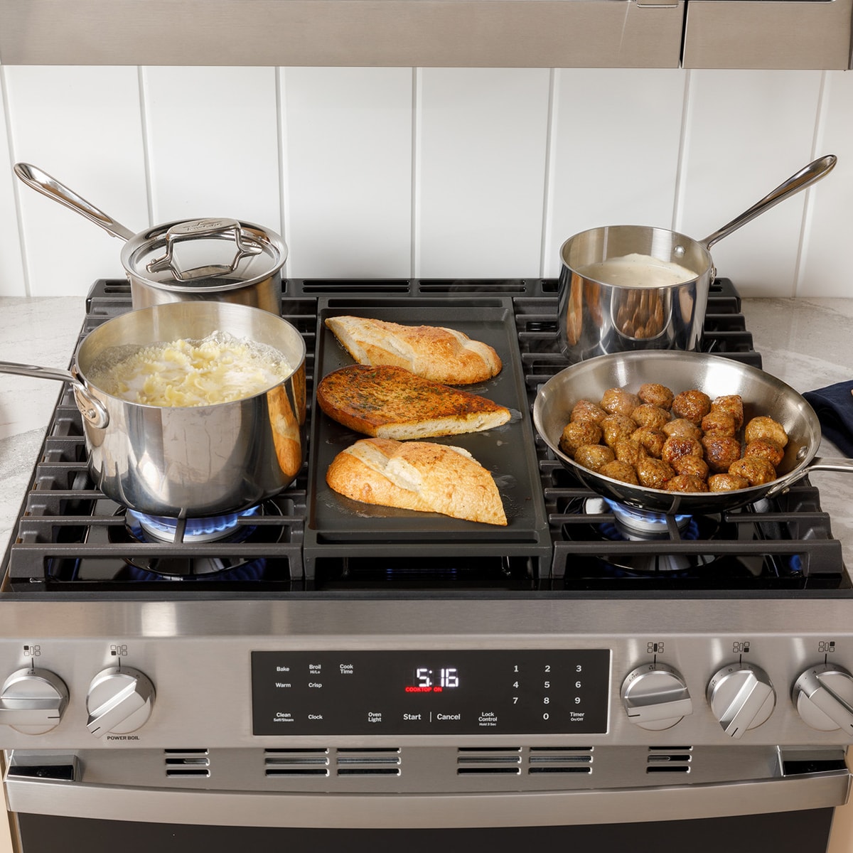 GE 500 Series 30 in. 5.3 cu. ft. Slide-In Gas Range with 5 Sealed Burners & Griddle - Stainless Steel, , hires